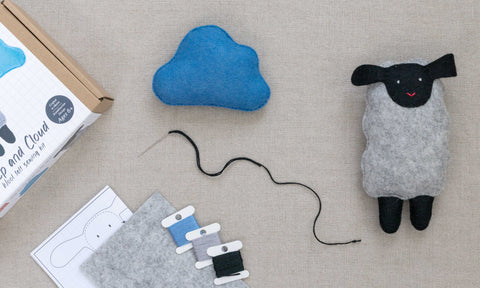 sewing kit with thread and final sheep with cloud