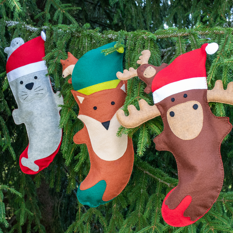 DIY moose, fox and seal felt Christmas stocking sewing kits, holiday decor craft.