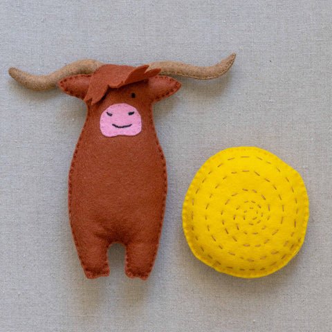 Highland Cow and Hay bale Mimihali