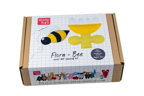 Handmade felt flower and bee from beginner sewing kit