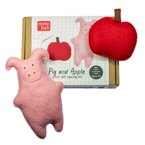 Pink plush pig and red plush apple with 'mimihali' packaging on a white background
