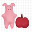 Pink pig-shaped toy and red apple-shaped toy on a grid background