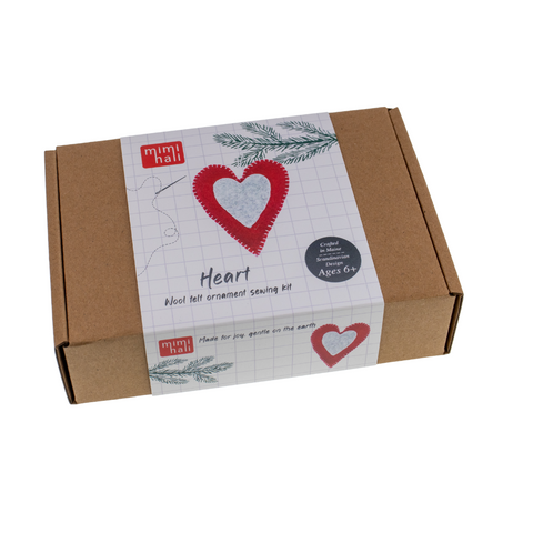Cardboard box with a heart design and 'mimihali branding on a white background