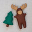 Felt moose and tree felt plush toys on a neutral  background